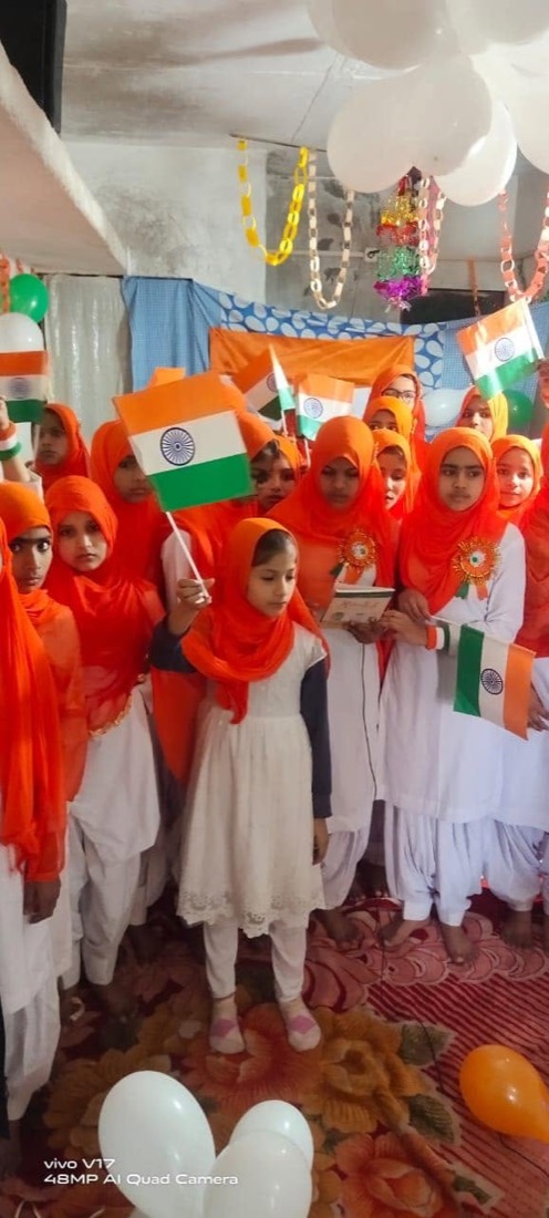 A student holding the Indian flag during the Independence Day celebration