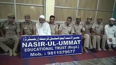 Trust members with local officials at the trust premises